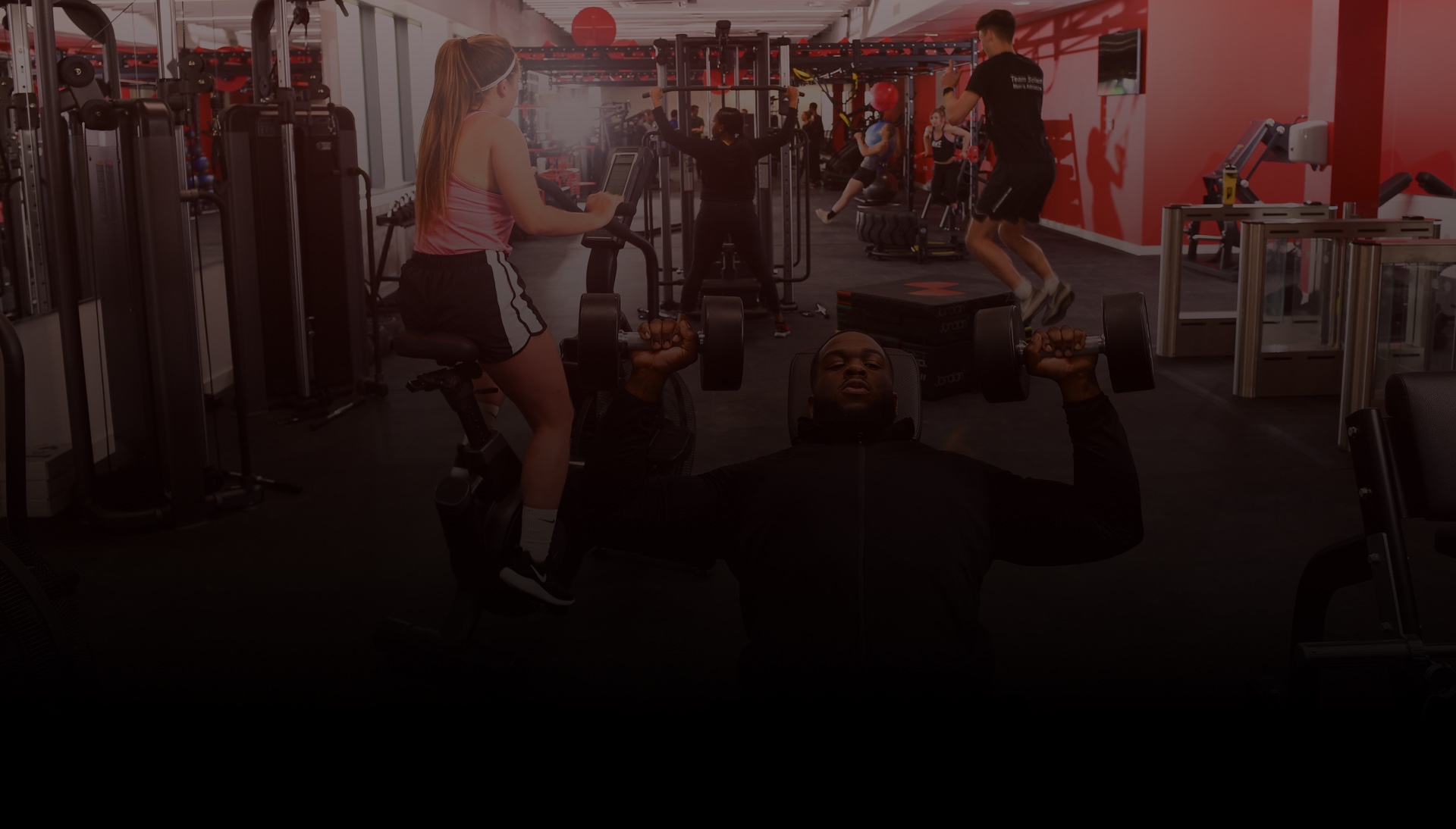 A group of people working out at the Solent Sports Complex gym